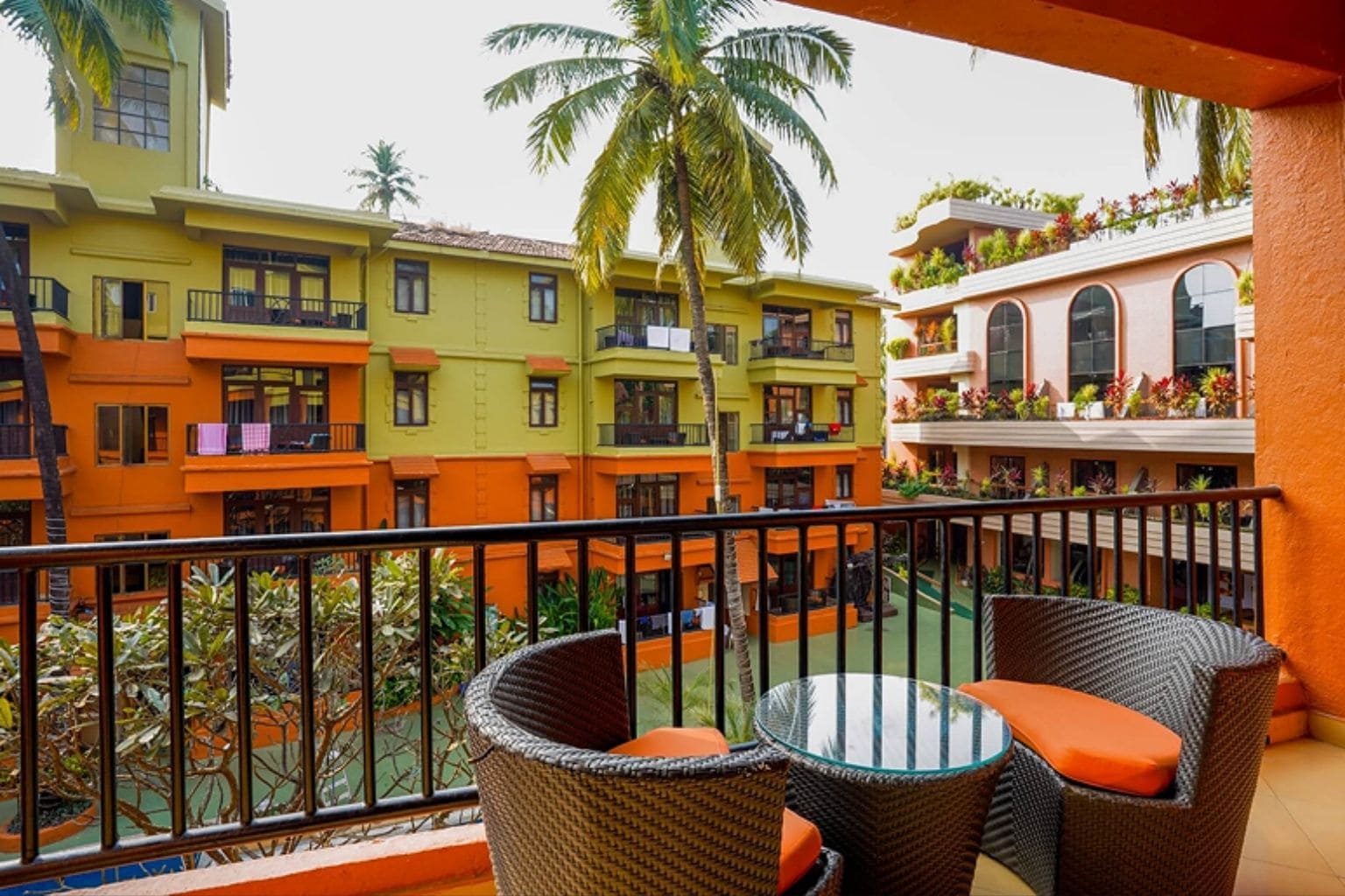 Neelams The Grand hotel balcony overlooking the pool